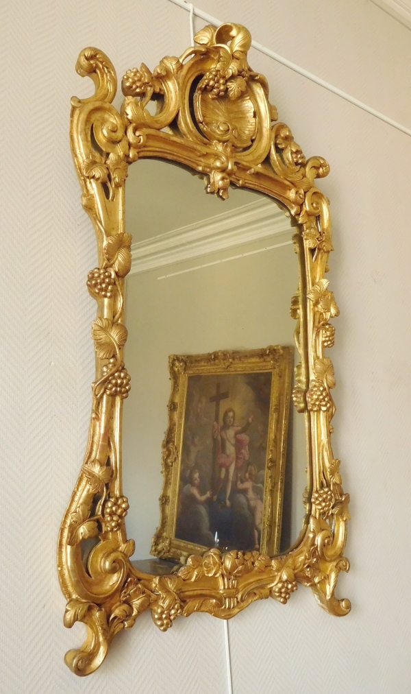 Louis XV gilt wood mirror, mercury glass, 18th century