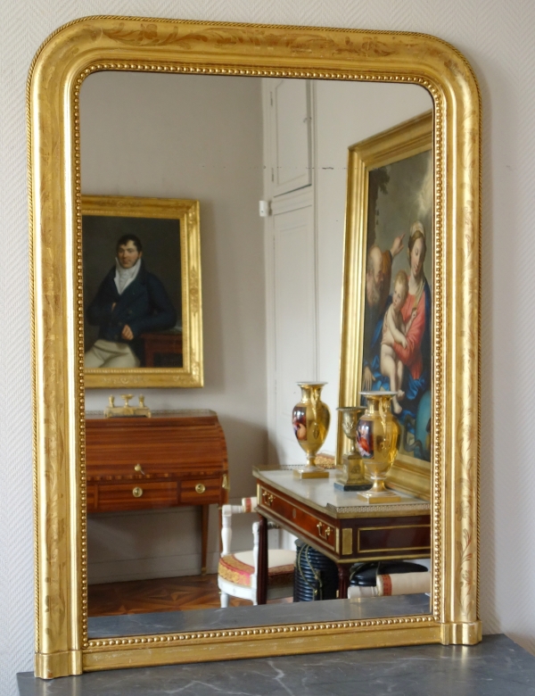 Miroir en bois doré à la feuille d'or, glace au mercure, époque Louis Philippe Napoléon III