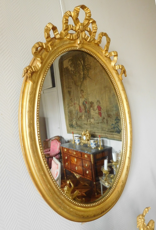 Louis XVI style gilt wood oval mirror, Napoleon III period - 19th century - 69,5cm x 103cm
