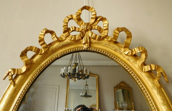 Louis XVI style gilt wood oval mirror, Napoleon III period - 19th century - 69,5cm x 103cm