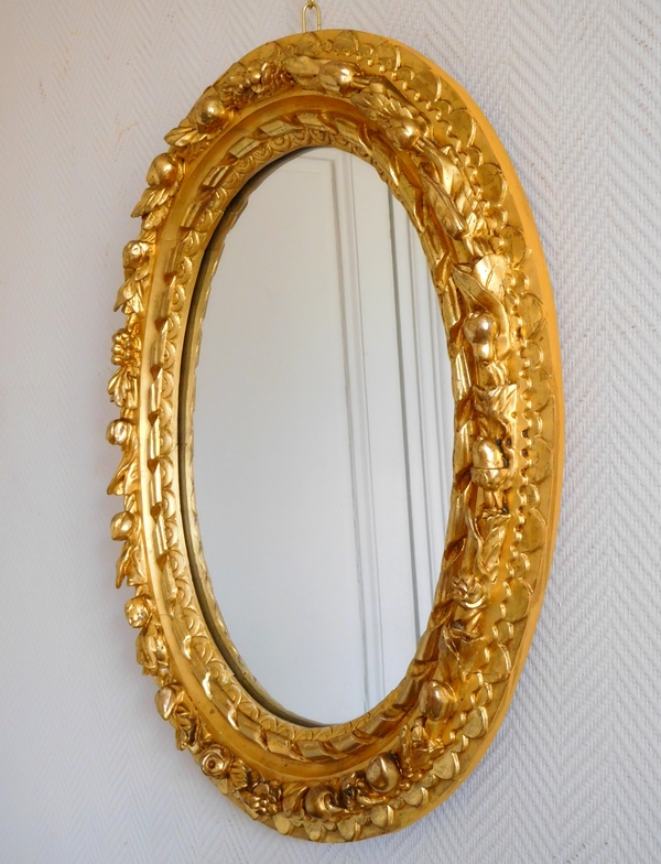 17th century ovale mirror, sculpted and gilt wood frame, Louis XIII period