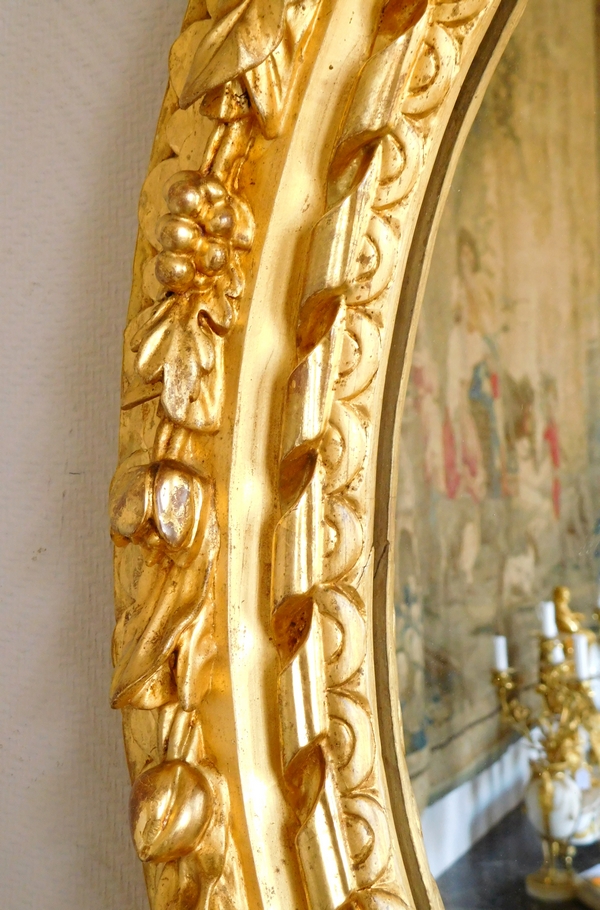 17th century ovale mirror, sculpted and gilt wood frame, Louis XIII period