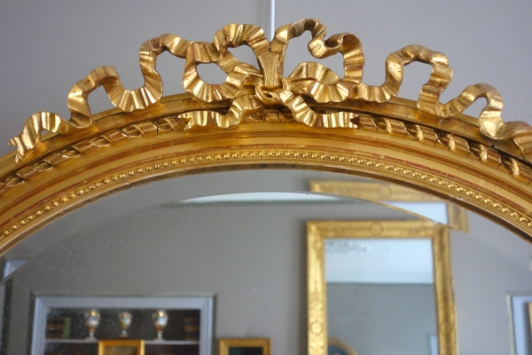 Wide Louis XVI style ovale mirror, gold leaf gilt wood, Napoleon III period, 19th century - 96cm x 91cm