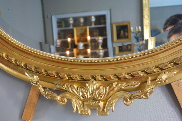 Wide Louis XVI style ovale mirror, gold leaf gilt wood, Napoleon III period, 19th century - 96cm x 91cm