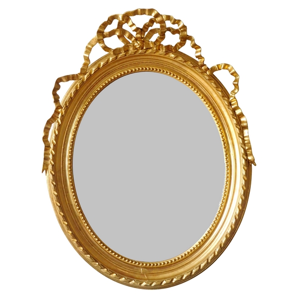 Miroir ovale de style Louis XVI en bois doré, glace au mercure - 86cm x 112cm