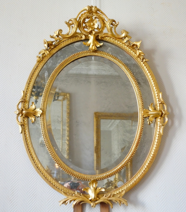 Gold leaf gilt wood oval mirror, mercury mirror, Napoleon III production