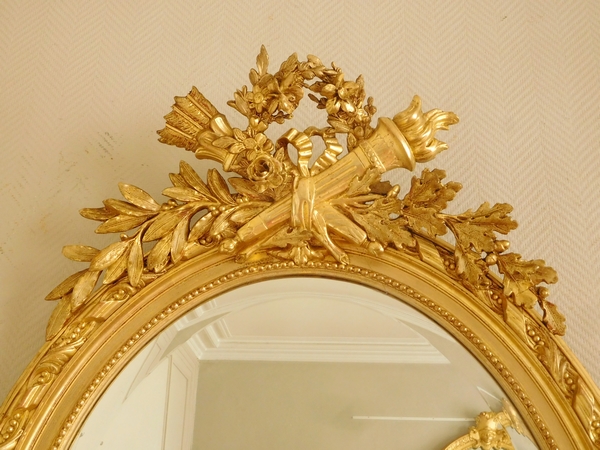 Grand miroir ovale de style Louis XVI en bois doré à la feuille d'or époque Napoleon III - 119cm x 79cm