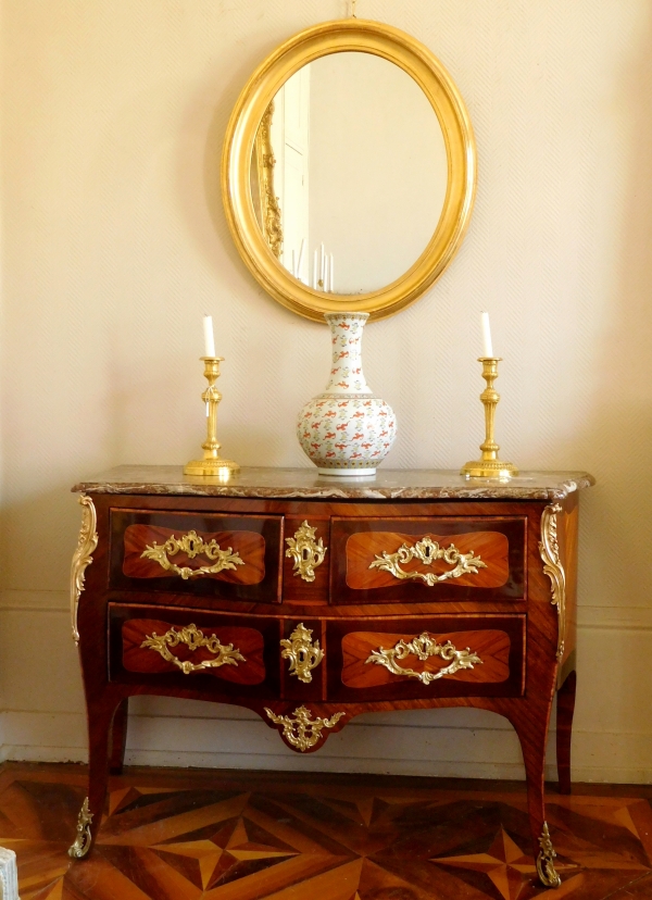 Miroir ovale en bois doré à la feuille d'or, glace au mercure, d'époque XIXe - 80cm x 67cm