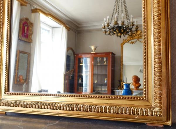 Miroir de cheminée / à suspendre de style Louis XVI en bois doré décor noeud ruban 82cm x 127cm