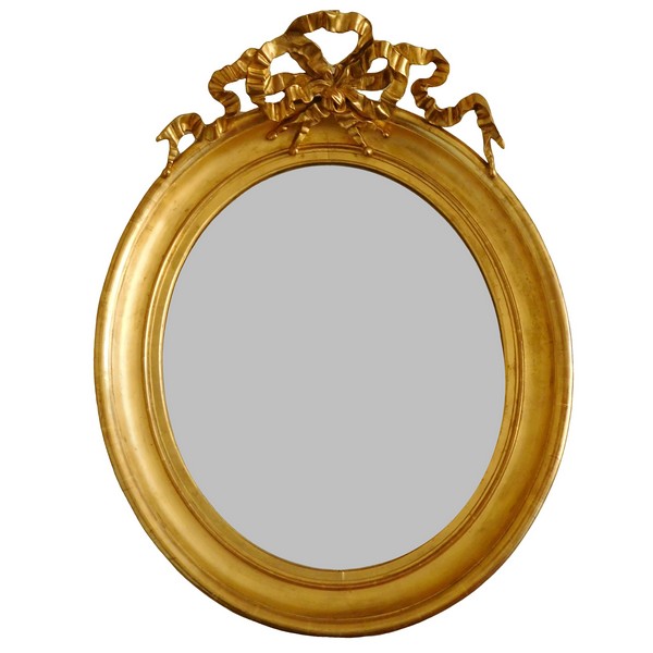 Grand miroir ovale de style Louis XVI en bois doré, glace au mercure - 71cm x 91cm
