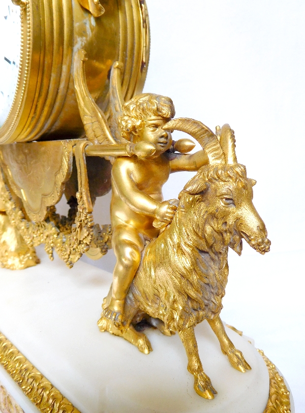 Louis XVI style ormolu and marble clock, bacchante and goats