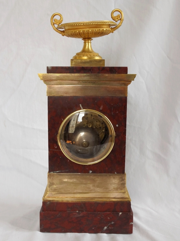 Tall ormolu and red marble Empire clock, early 19th century circa 1815-1820