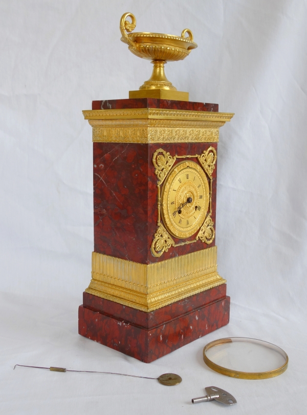 Tall ormolu and red marble Empire clock, early 19th century circa 1815-1820