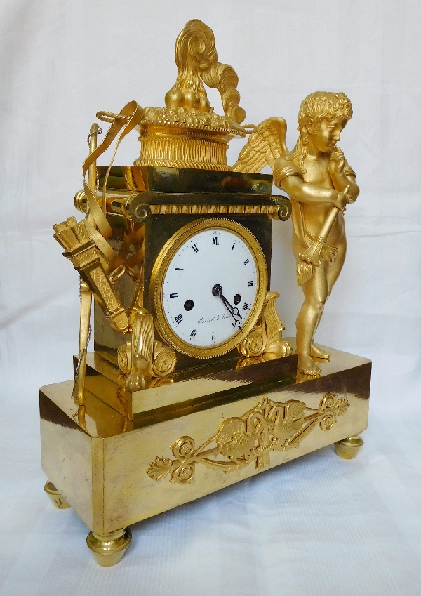 Empire ormolu clock, allegory of Love burning hearts - France early 19th century 