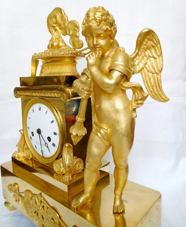 Empire ormolu clock, allegory of Love burning hearts - France early 19th century 