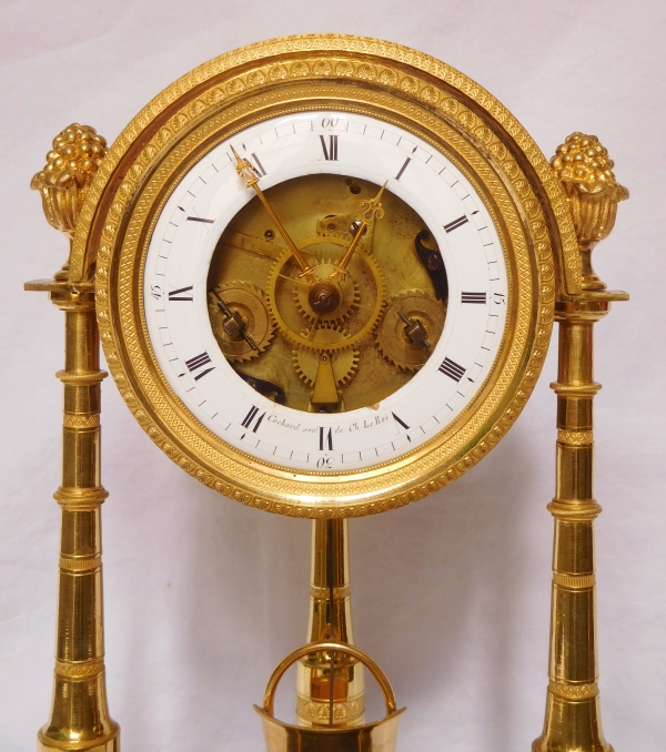Ormolu and portor marble skeleton clock signed Cachard, late 18th century