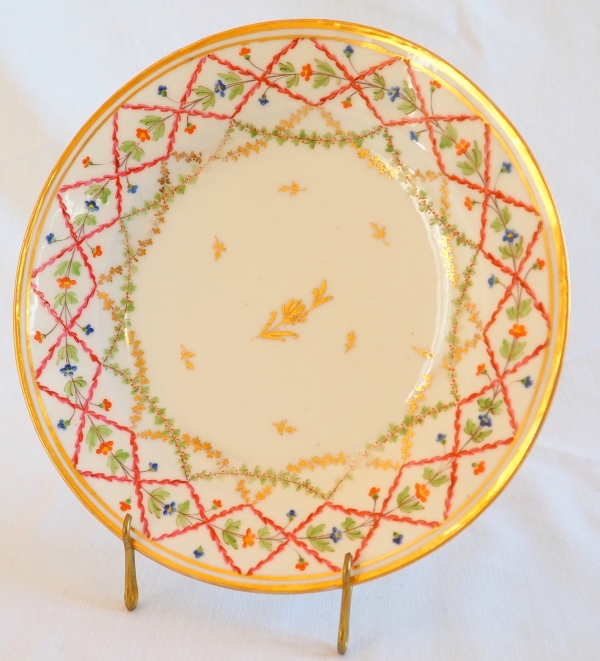Set of 12 Louis XVI porcelain polychromatic dessert plates enhanced with fine gold, late 18th century
