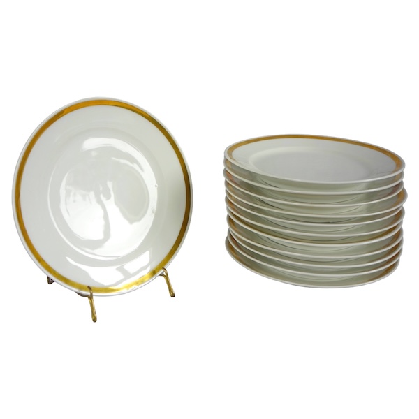 Set of 12 Paris porcelain dessert plates enhanced with fine gold, early 19th century