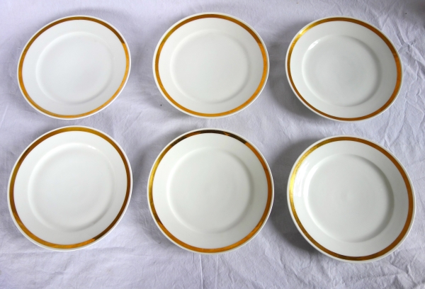 Set of 12 Paris porcelain dessert plates enhanced with fine gold, early 19th century