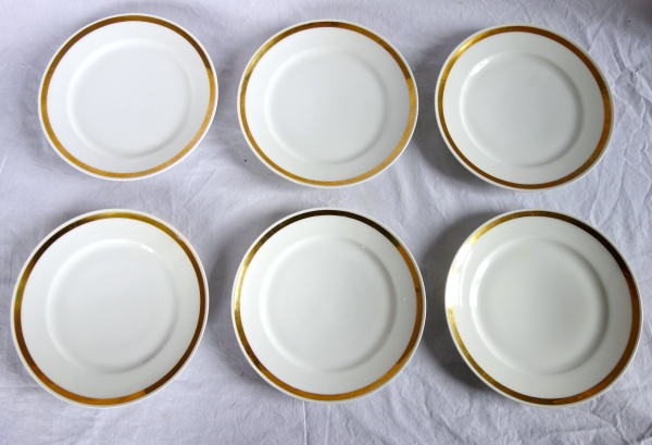 Set of 12 Paris porcelain dessert plates enhanced with fine gold, early 19th century