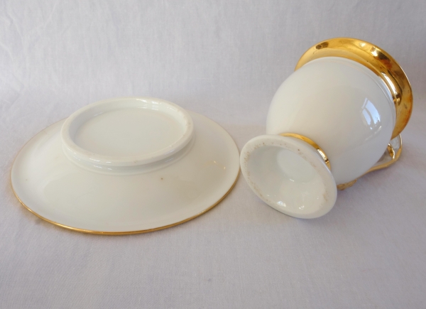 Pair of Empire Paris porcelain coffee cups enhanced with fine gold, early 19th century