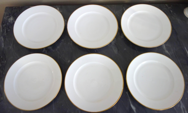 Nast : 12 assiettes de table & 12 à dessert - porcelaine à filet or - époque Empire - signées