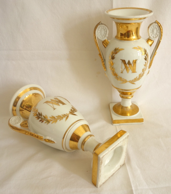 Pair of Empire Paris porcelain vases enhanced with fine gold, early 19th century