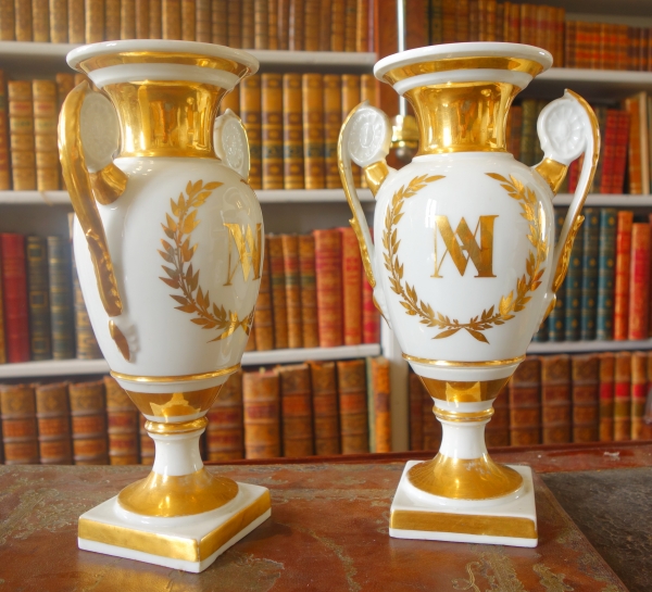 Pair of Empire Paris porcelain vases enhanced with fine gold, early 19th century