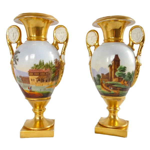 Pair of Empire Paris porcelain vases, biscuit handles, polychromatic landscapes