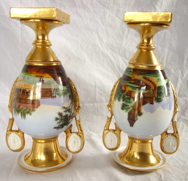 Pair of Empire Paris porcelain vases, biscuit handles, polychromatic landscapes
