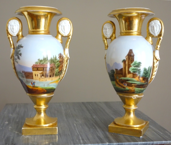 Pair of Empire Paris porcelain vases, biscuit handles, polychromatic landscapes