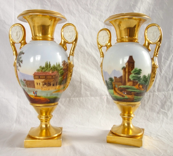 Pair of Empire Paris porcelain vases, biscuit handles, polychromatic landscapes