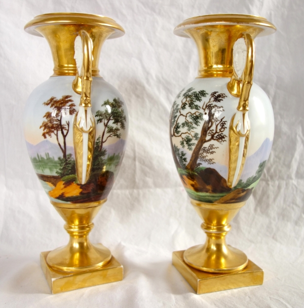 Pair of Empire Paris porcelain vases, biscuit handles, polychromatic landscapes