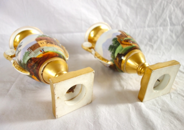 Pair of Empire Paris porcelain vases, biscuit handles, polychromatic landscapes