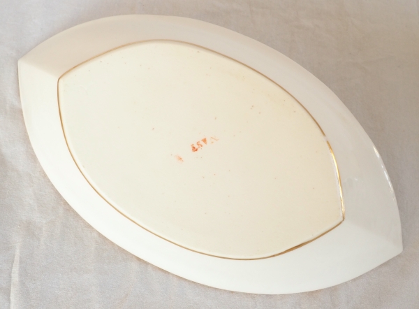 Nast : saucière d’époque Empire en porcelaine de Paris blanche et or