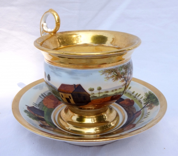 Large Paris porcelain breakfast cup gilt with fine gold, landscape decoration, early 19th century circa 1820