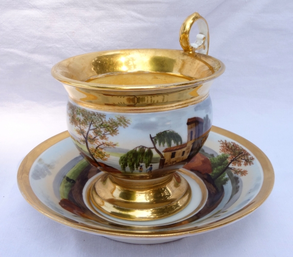 Large Paris porcelain breakfast cup gilt with fine gold, landscape decoration, early 19th century circa 1820