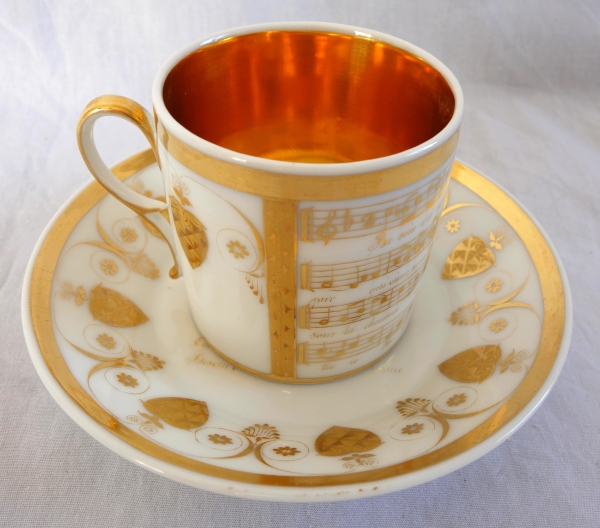 Empire porcelain coffee cup decorated with a score - early 19th century