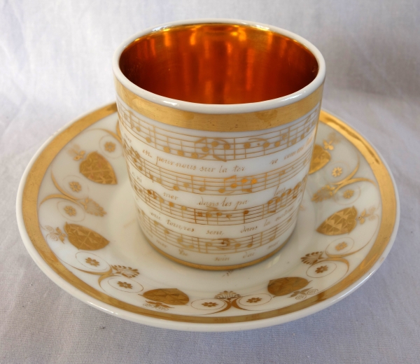 Empire porcelain coffee cup decorated with a score - early 19th century