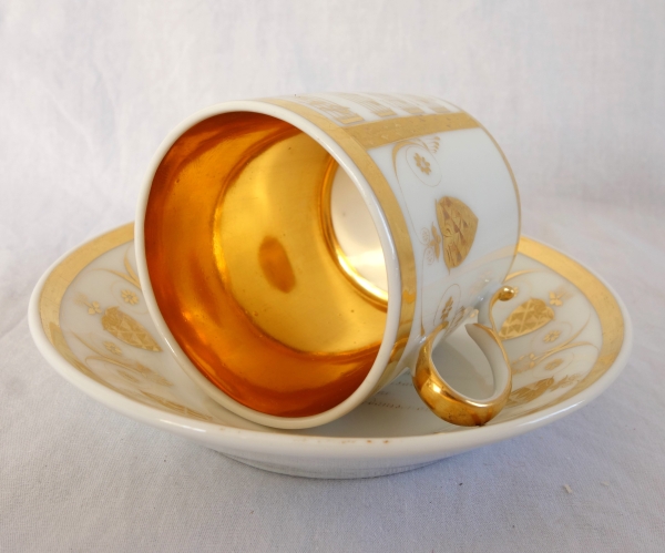 Empire porcelain coffee cup decorated with a score - early 19th century
