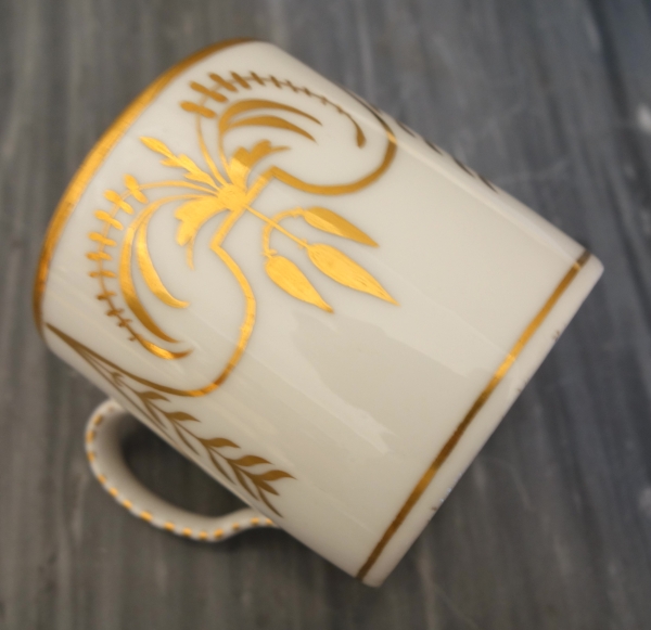Paris porcelain litron shaped cup enhanced with fin gold attributed to Darte