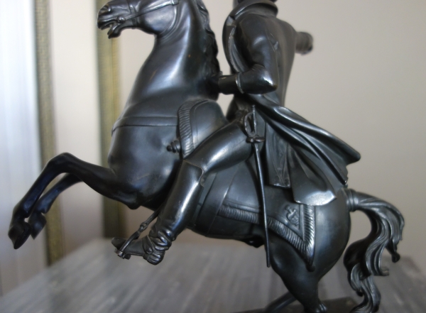 Emperor Napoleon riding his horse, patinated bronze, early 19th century