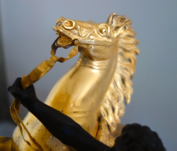 An ormolu and patinated bronze Marly Horse after Coustou - early 19th century