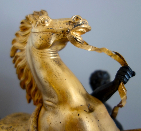 An ormolu and patinated bronze Marly Horse after Coustou - early 19th century