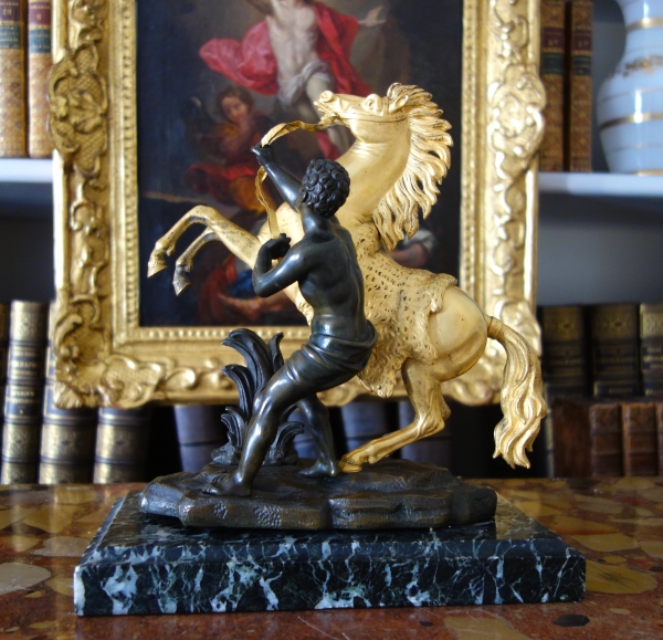 An ormolu and patinated bronze Marly Horse after Coustou - early 19th century