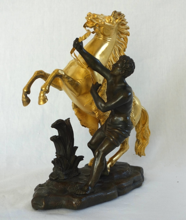 An ormolu and patinated bronze Marly Horse after Coustou - early 19th century
