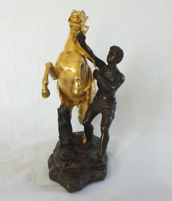 An ormolu and patinated bronze Marly Horse after Coustou - early 19th century