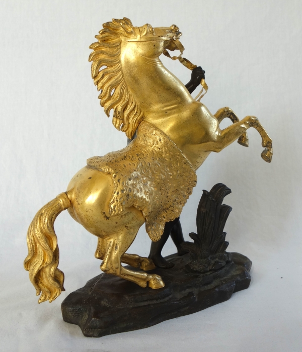 An ormolu and patinated bronze Marly Horse after Coustou - early 19th century