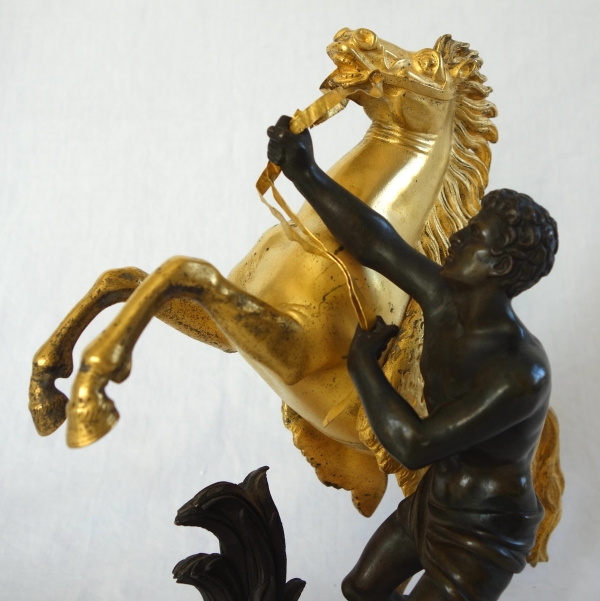 An ormolu and patinated bronze Marly Horse after Coustou - early 19th century