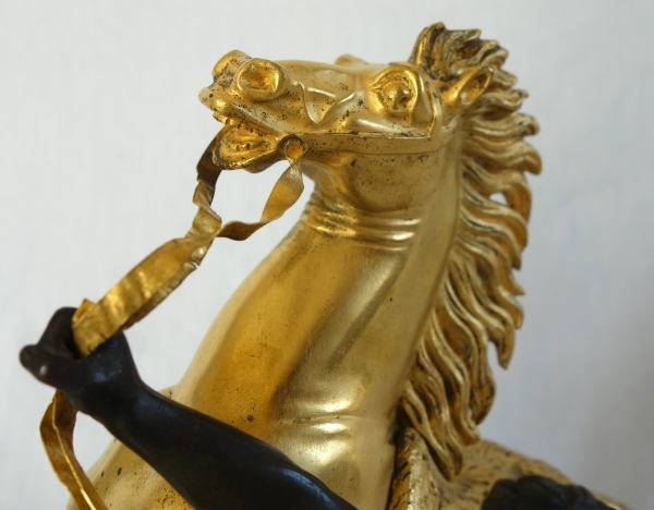 An ormolu and patinated bronze Marly Horse after Coustou - early 19th century